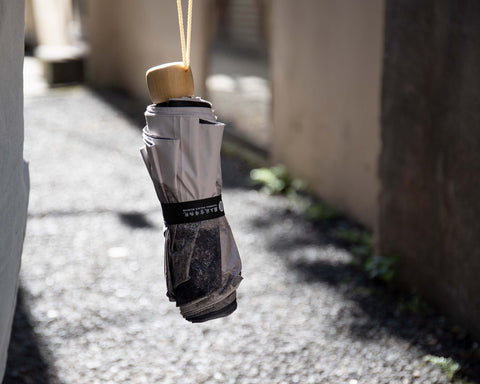 Take a look at the cat's umbrella